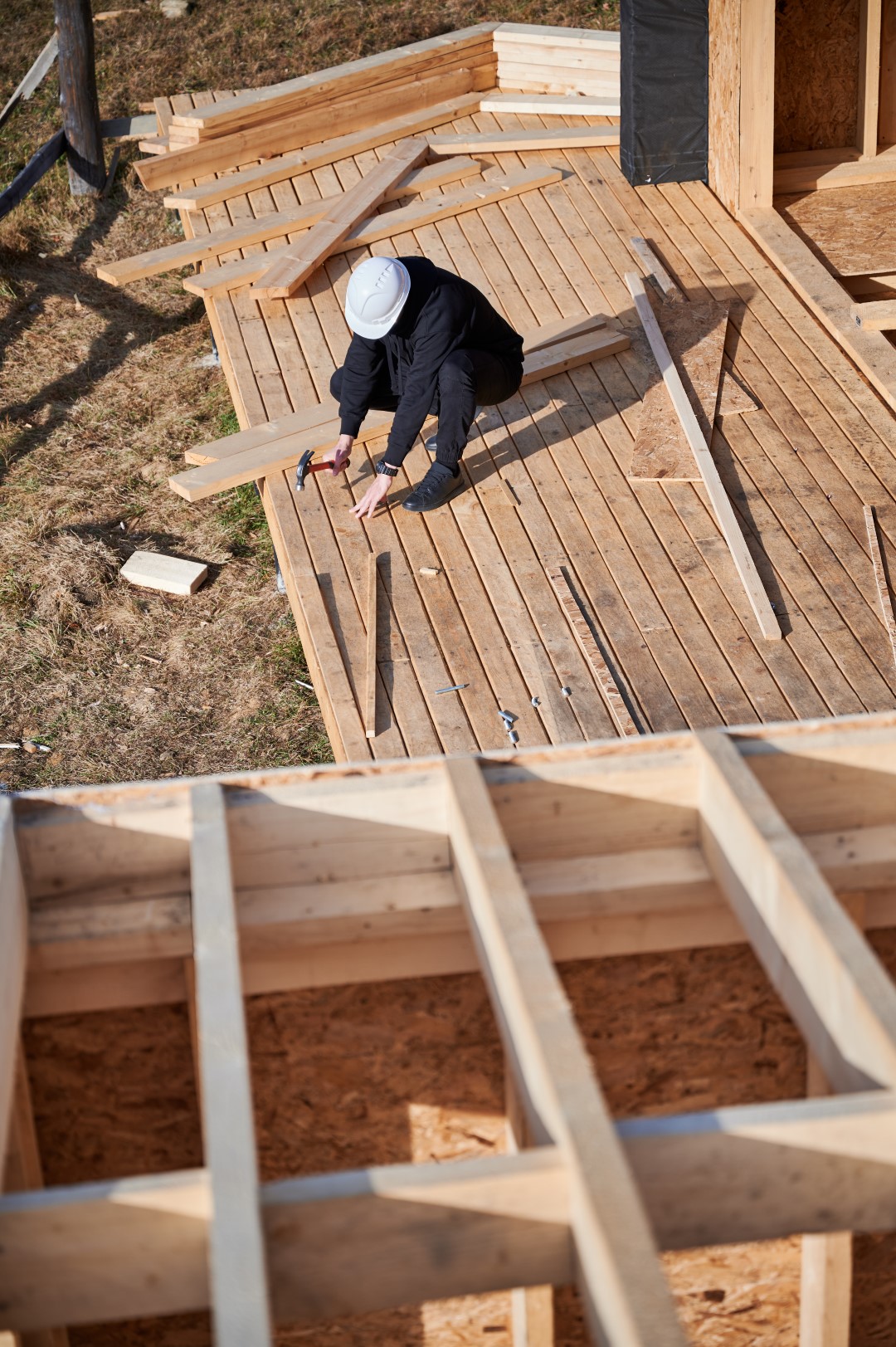 man worker hammering while building wooden frame h 2026 03 17 02 14 10 utc Large